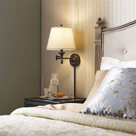 Bedroom lamps can be a challenging home decor issue: Conserve valuable bedside table space by installing a chic ...