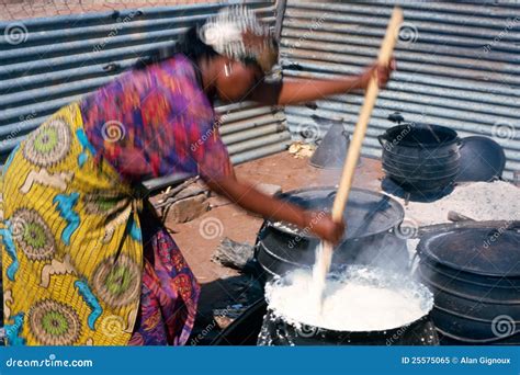 African Woman Cooking