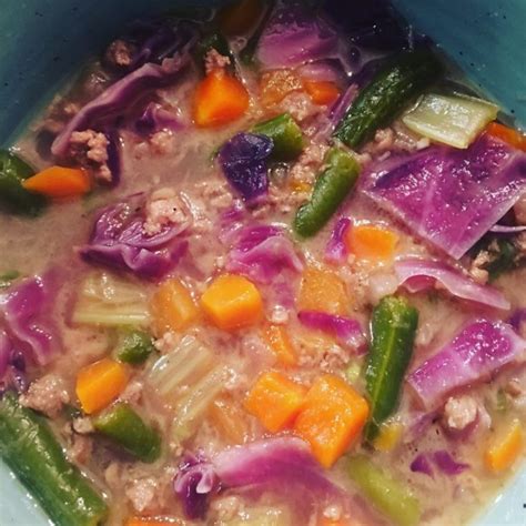 In a large dutch oven, brown ground beef and cook into crumbles (about 8 minutes). Hamburger & Purple Cabbage Soup - The Health Nut Mama