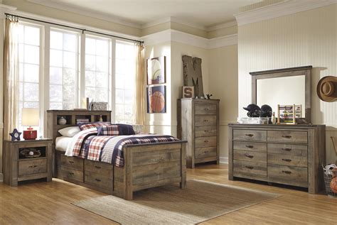 Signature Design By Ashley Trinell Rustic Look Twin Bookcase Bed With