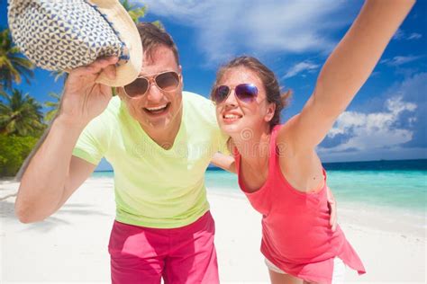 Attractive Couple Enjoying Sunny Day At Maldives Beach Stock Image Image Of Family Ocean