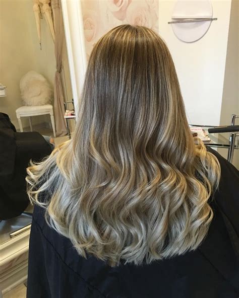 Ash blonde hair is a shade of blonde that has darker roots and a hint of gray, creating an ashy blonde tone. 50 Stunning Light and Dark Ash Blonde Hair Color Ideas ...