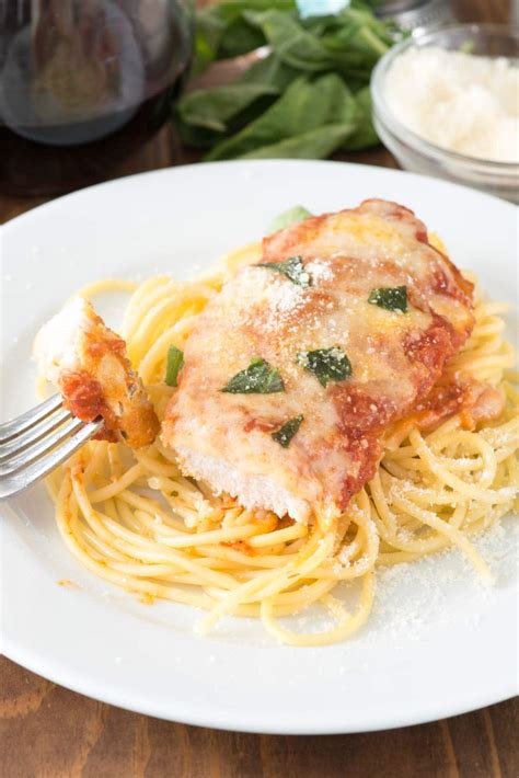 This easy baked chicken parmesan recipe is so simple it's ready to eat in about 30 minutes. Easy Chicken Parmesan Recipe | Crazy for Crust