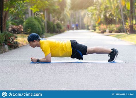 Young Asian Men Doing Plank Exercise Stock Photo Image Of Road