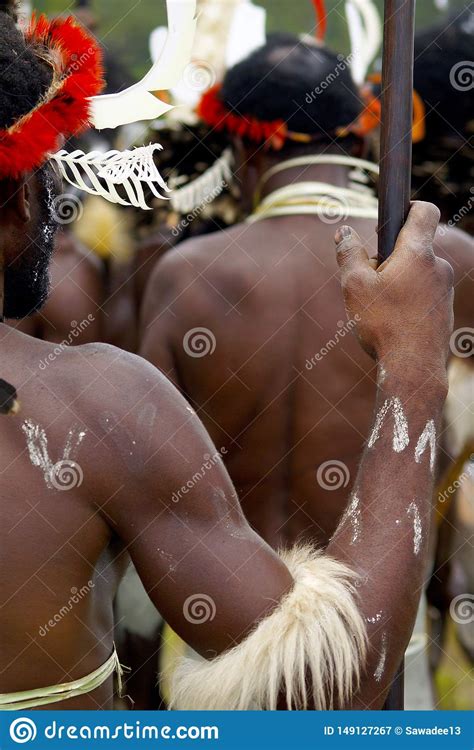 Dani People During Tribe Festival In Wamena Editorial Photography