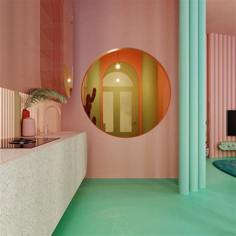 A Room With Pink Walls And Green Flooring In Front Of A Mirror On The Wall