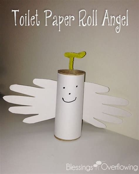 A Toilet Paper Roll Angel With A Smiley Face On Its Side And The Words