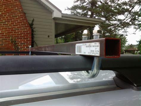 Just add more roof rails. A Home Made Family: DIY Roof rack cross beams