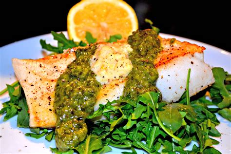 Make perfectly cooked chilean sea bass every time by searing it on the stove, then baking it in the oven. Chilean Sea Bass with Basil Pesto, Creamed Corn and Arugula - A Hint of Wine