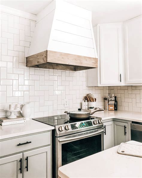 These diy painted kitchen cabinets changed the entire look of my kitchen with a little elbow grease and minimal financial investment. Painting Kitchen Cabinets Yourself - Pretty in the Pines ...
