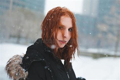 Redhead In The Snow Looking Into The Camera Stock Image Image Of