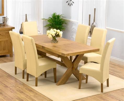 With solid oak dining room furniture, you can give the space a unique, cozy look. 20 Photos Chunky Solid Oak Dining Tables and 6 Chairs ...