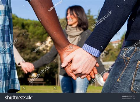 Multiracial Young People Holding Hands Circle Stock Photo 67797679