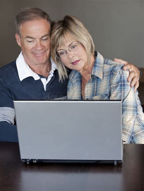 Mature Couple Using Laptop Stock Photo Image Of Love 26999770