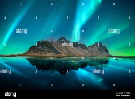 Aurora Borealis Northern Lights Over Famous Stokksnes Mountains On