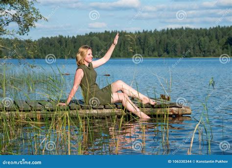 Beautiful Woman Sitting By The Lake Stock Photo Image Of Girl Lifestyle