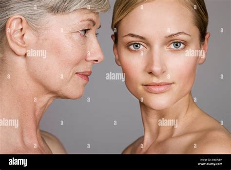Faces Of Young And Senior Women Stock Photo Alamy