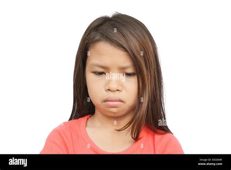 Portrait Of A Sad Poor Child With A Sad Crying Expression Stock Photo