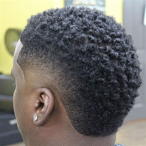 We love how this particular hairstyle stands out from other men's hair cuts. The Best Haircut Styles For Black Men (MODERN TRENDS)