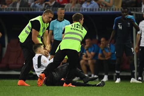 world cup anti kremlin protesters invade pitch during final the straits times