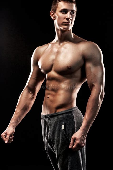 Very Muscular Man Posing With Naked Torso In Studio Stock Image Image Of Body Chest