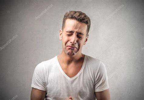 Sad Young Man Crying — Stock Photo © Olly18 34439227
