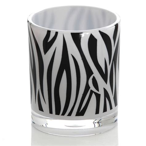 Zebra can be imbibed in accessories, wall art. zebra bathroom set