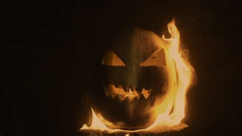 Scary Carved Halloween Pumpkin In Hot Burning Hell Fire Flames The Big