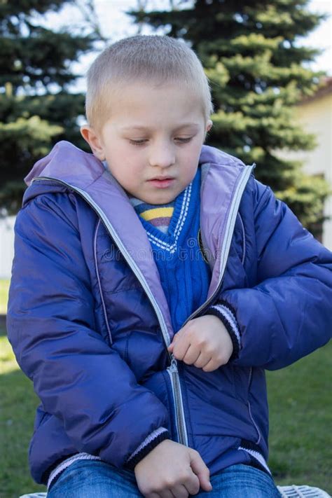 Boy Wearing A Jacket With A Zipper Stock Image Image Of Handcarves