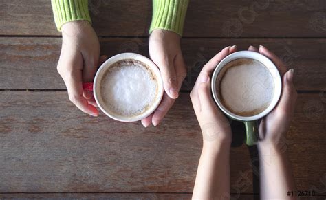 Two Hand Holding Coffee Cup Stock Photo Crushpixel