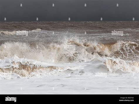 Breaking Waves And Water Norfolk Coastline East Anglia Stock Photo