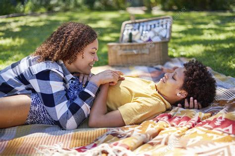 Happy Lesbian Couple On Picnic Blanket Stock Image F0378993 Science Photo Library