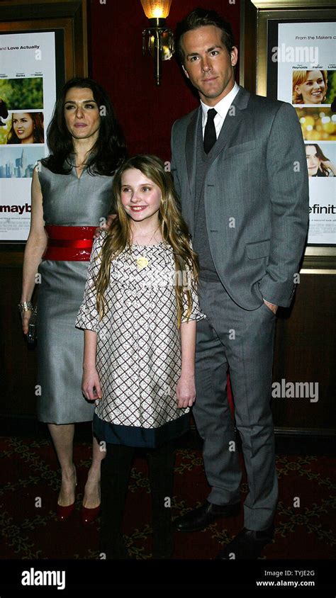 cast members l r rachel weisz abigail breslin and ryan reynolds pose for pictures at the