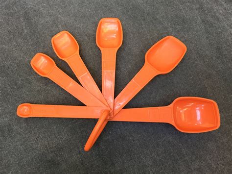 Assessing information about cultures by using cd roms, etc. 70's Orange Tupperware Measuring Spoons // Set of 6 ...