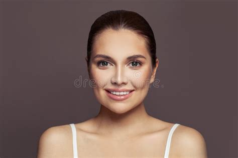 Healthy Model Woman With Clear Skin And Straight Hair Smiling Skincare And Facial Treatment