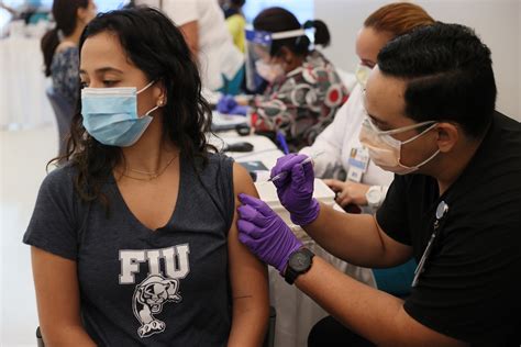 American And Georgetown Universities To Require Students To Coronavirus
