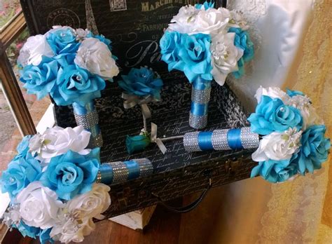 From a groom ' s corsage to epic wedding centerpieces, choosing the wedding flowers that you love is important, and should be done early on in the wedding planning process. 17 Piece Malibu Blue White Silver Wedding Flower Set Bridal