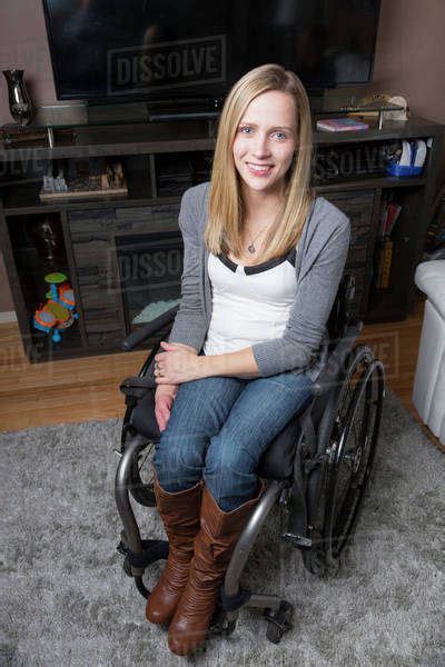 Young Disabled Woman In A Wheelchair In Her Living Room Spruce Grove