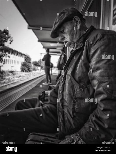 Old Man Waiting For The Train Stock Photo Alamy