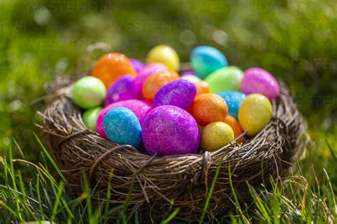 Sparkling Easter Eggs In Nest Stock Photo