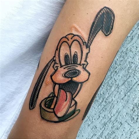 Dog tattoos are admired by almost every person on the planet. Tattoo uploaded by JenTheRipper | Pluto tattoo by Luca Testadiferro #LucaTestadiferro #sketch # ...