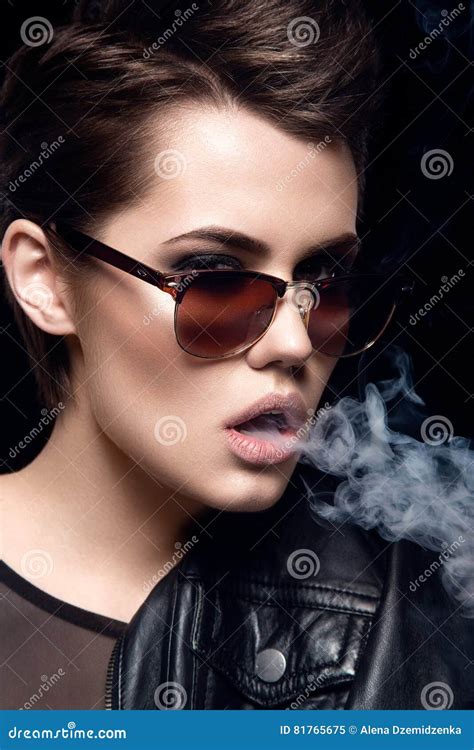 Fashion Model Smoking Cigarette Wearing Sunglasses Woman Portrait Over