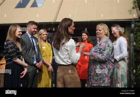 the duchess of cambridge talking to sue biggs director general of the royal horticultural