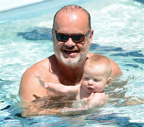 Kelsey Grammer Kisses His Daughter Faith As They Enjoy A Dip In The