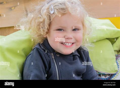 Portrait Of Cute Smiling Blonde Toddler Girl Happy Healthy Little