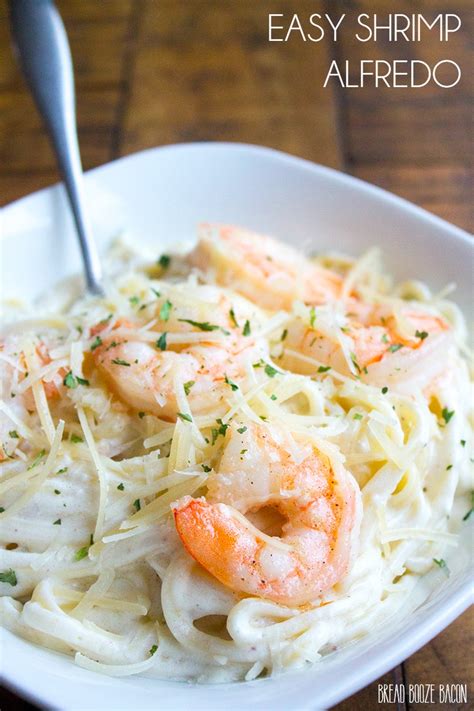 This easy shrimp alfredo recipe has gotten rave reviews from my family, our amazing readers, and i know it will at portion the pasta and shrimp into 4 bowls. Easy Shrimp Alfredo - Bread Booze Bacon