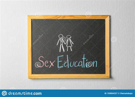 small blackboard with written phrase `sex education` stock image image of learning exam