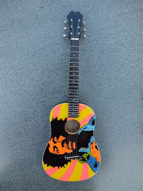 As a young guitar player, perhaps no one inspired me as much as jimi hendrix, though i never dreamed i'd attain even a fraction of his skill. Jimi Hendrix Acoustic Miniature Guitar (RGM157)