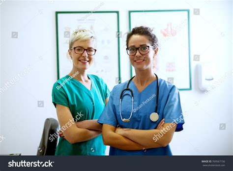 Portrait Two Professional Happy Nurses Eyeglasses Stock Photo 769567156