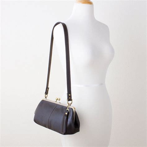 Brown Leather Kiss Lock Shoulder Bag With Tassel Charm Retro Style